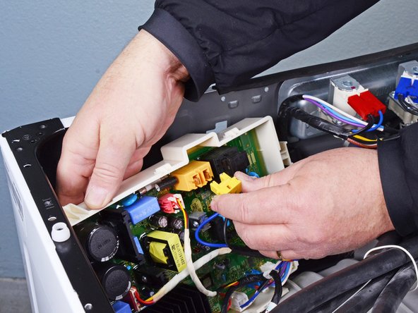 LG Front Load Washing Machine Main Board Replacement, Remove the main board: crwdns2935265:014crwdnd2935265:02crwdnd2935265:03crwdne2935265:0