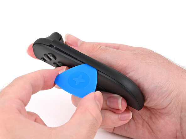 Joy-Con 2 (Right) Joystick Replacement, Separate the plastic strip: crwdns2935265:03crwdnd2935265:02crwdnd2935265:03crwdne2935265:0