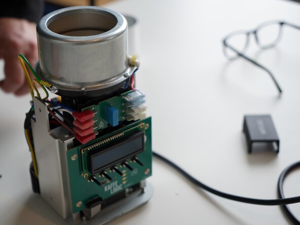 Kaffelogic Nano 7/LINK (D-P Serial) Stack Replacement, Remove the mains wiring cover: crwdns2935265:09crwdnd2935265:03crwdnd2935265:03crwdne2935265:0