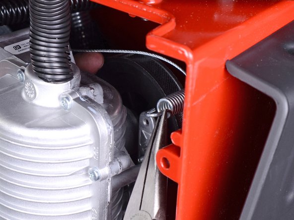 Toro Walk Behind Mowers 21199HD 2018 Traction Cable Replacement, Unhook the traction cable spring: crwdns2935265:08crwdnd2935265:03crwdnd2935265:03crwdne2935265:0