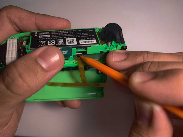 Nintendo Switch Right Joy-Con SL/SR Button Board Replacement: crwdns2935265:06crwdnd2935265:02crwdnd2935265:03crwdne2935265:0