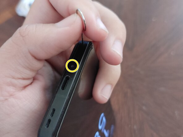 Asus Zenfone 10 SIM Card Replacement, Insert SIM tool: crwdns2935265:02crwdnd2935265:01crwdnd2935265:01crwdne2935265:0