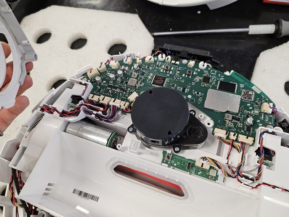 Roborock Q Revo: Laser Distance Sensor Replacement, Remove the LDS cage.: crwdns2935265:010crwdnd2935265:03crwdnd2935265:03crwdne2935265:0