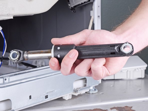 LG Front Load Washing Machine Dampers Replacement, Remove the damper: crwdns2935265:032crwdnd2935265:03crwdnd2935265:03crwdne2935265:0