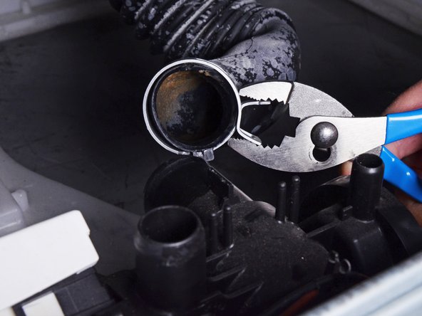 LG Front Load Washing Machine Pump Hose Replacement, Disconnect the tub to pump hose: crwdns2935265:027crwdnd2935265:03crwdnd2935265:03crwdne2935265:0