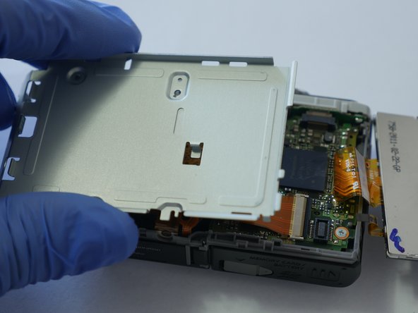 Panasonic Lumix DMC-FH27 Main Board PCB Replacement, Step 10: crwdns2935265:010crwdnd2935265:02crwdnd2935265:03crwdne2935265:0