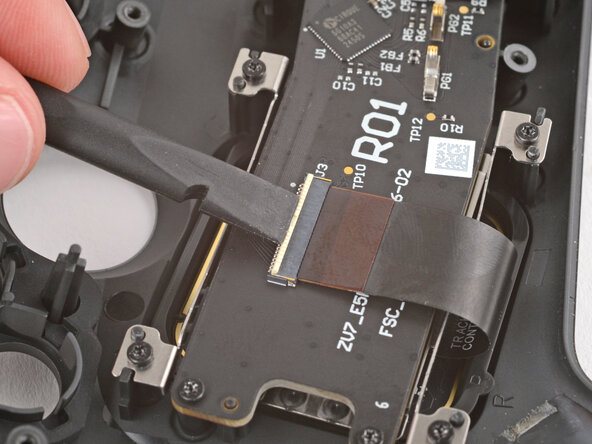 Steam Controller (2nd Gen, 2026) Buttons Replacement, Disconnect the touchpad cables: crwdns2935265:023crwdnd2935265:03crwdnd2935265:03crwdne2935265:0