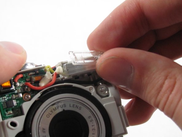 Removing Olympus FE-210 Flash Assembly: crwdns2935265:08crwdnd2935265:02crwdnd2935265:02crwdne2935265:0