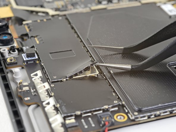 Microsoft Surface Pro 5 Rear-Facing Camera Replacement, Remove the camera connector shield: crwdns2935265:031crwdnd2935265:02crwdnd2935265:03crwdne2935265:0