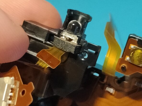 Sony A7 II Top Flex Cable replacement, Inserting AF assist lamp: crwdns2935265:039crwdnd2935265:03crwdnd2935265:03crwdne2935265:0