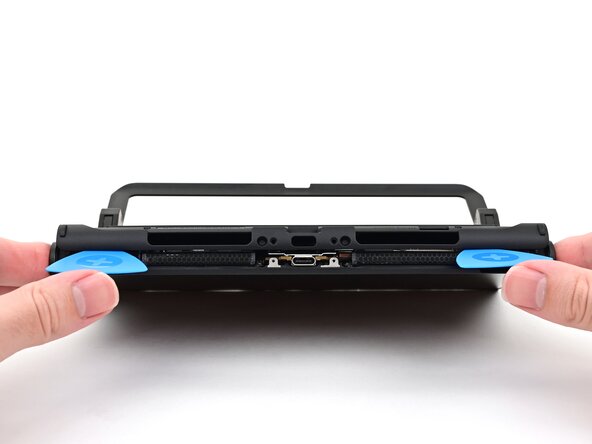 Nintendo Switch 2 Microphone Replacement, Remove the back cover: crwdns2935265:017crwdnd2935265:03crwdnd2935265:03crwdne2935265:0