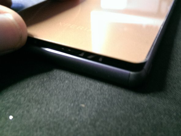 How to replace a broken back cover on a Sony Xperia Z3, Placing the new cover.: crwdns2935265:011crwdnd2935265:02crwdnd2935265:02crwdne2935265:0