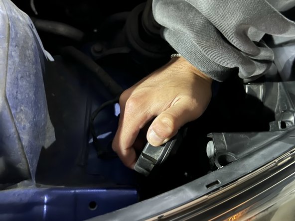 2014 Hyundai Veloster Headlight Replacement: step 6, image 3 of 3