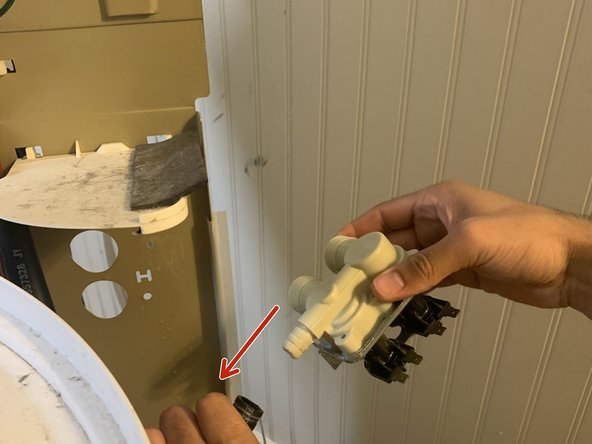 Kenmore 80 Series Washer Water Inlet Valve Replacement, Remove clamp from interior water hose: crwdns2935265:010crwdnd2935265:03crwdnd2935265:03crwdne2935265:0