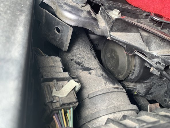 2012 Ford Fusion Headlight Replacement: step 5, image 2 of 2