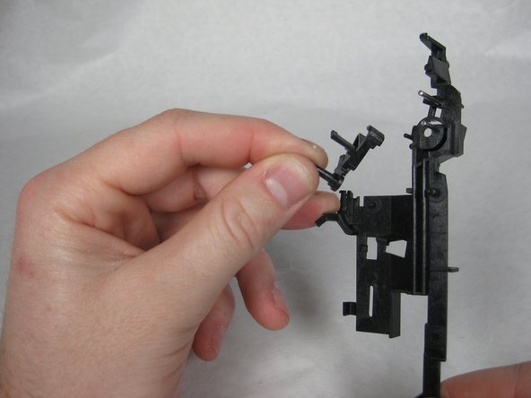 Remove the two loose plastic pieces.