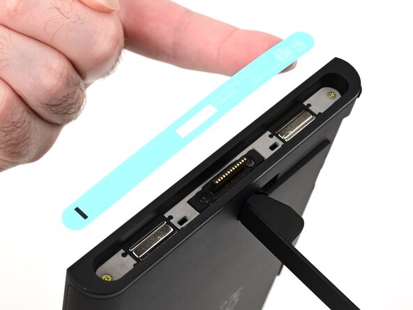 Nintendo Switch 2 Microphone Replacement, Remove the left side sticker: crwdns2935265:09crwdnd2935265:03crwdnd2935265:03crwdne2935265:0