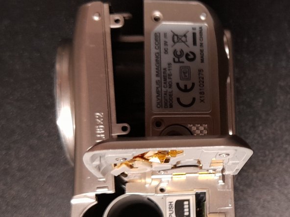 Olympus FE-115 Case removal, Final removal: crwdns2935265:04crwdnd2935265:02crwdnd2935265:02crwdne2935265:0