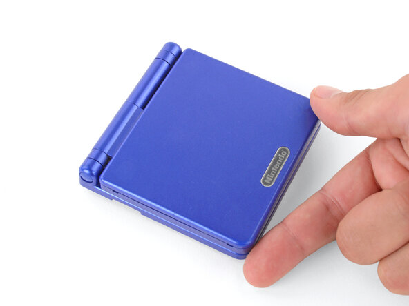 How to Reshell Your Game Boy Advance SP, Flip your Game Boy over: crwdns2935265:023crwdnd2935265:02crwdnd2935265:02crwdne2935265:0