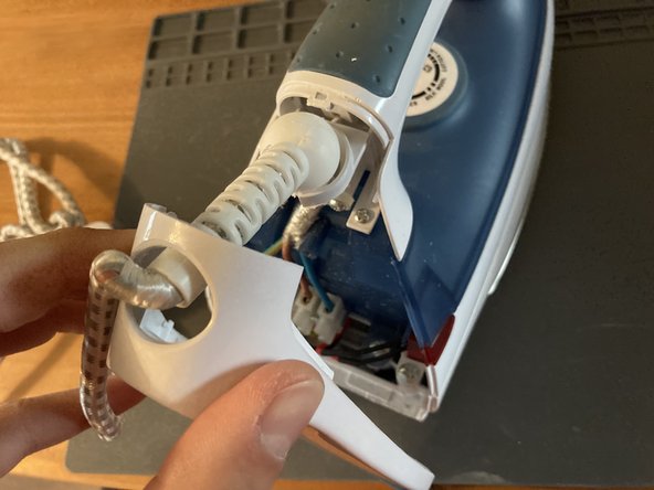 ASDA ES177 Steam Iron Power cord Replacement, Remove the back plate: crwdns2935265:02crwdnd2935265:03crwdnd2935265:03crwdne2935265:0