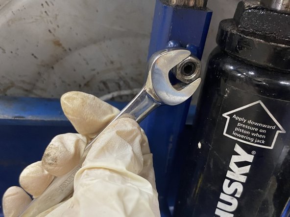 Electric Eel Drain Cleaner RK34IC100 Belt Adjustment, Taking Off The Hex Nut: crwdns2935265:06crwdnd2935265:02crwdnd2935265:02crwdne2935265:0