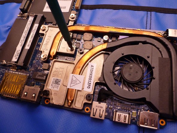 Alienware M11xR3 Disassembly and Cleaning, Remove heat sink and apply thermal paste: crwdns2935265:035crwdnd2935265:03crwdnd2935265:03crwdne2935265:0