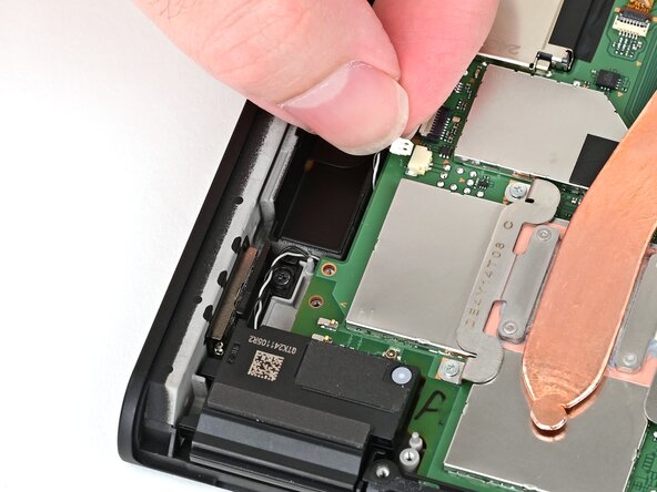 Nintendo Switch 2 Speakers Replacement, Unroute the right speaker cable: crwdns2935265:038crwdnd2935265:01crwdnd2935265:03crwdne2935265:0