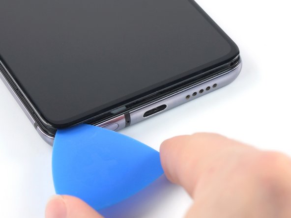 OnePlus 7T Screen Replacement, Slice the adhesive: crwdns2935265:022crwdnd2935265:03crwdnd2935265:03crwdne2935265:0