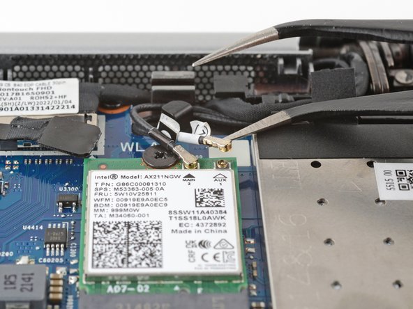 HP EliteBook 845 G9 Wi-Fi Module Replacement, Disconnect the WLAN module cables: crwdns2935265:08crwdnd2935265:02crwdnd2935265:03crwdne2935265:0