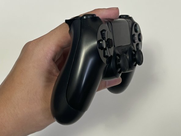 How to Clean The R2 and L2 Buttons on a Dualshock 4 CUH-ZCT2 Controller: crwdns2935265:08crwdnd2935265:02crwdnd2935265:02crwdne2935265:0