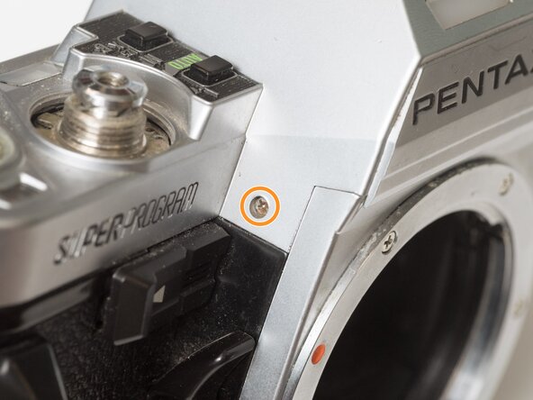 Pentax Super Program Top Cover Removal, Remove top cover screws: crwdns2935265:04crwdnd2935265:02crwdnd2935265:03crwdne2935265:0