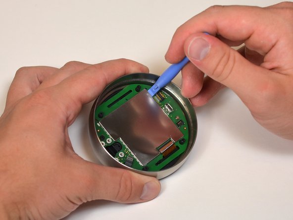 Nest Learning Thermostat 2nd Generation LCD Screen Replacement, Remove EMI shield from motherboard: crwdns2935265:012crwdnd2935265:02crwdnd2935265:02crwdne2935265:0