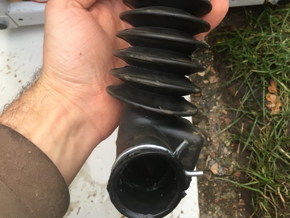 Unblocking Hotpoint NSWR 963C WK UK, Checking the Rubber drain hose: crwdns2935265:04crwdnd2935265:03crwdnd2935265:03crwdne2935265:0