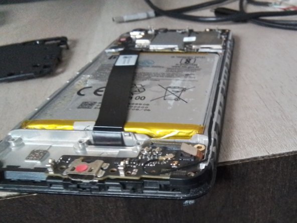 Xiaomi Redmi 7A Teardown, Remove the CC (Charge Connector) board: crwdns2935265:07crwdnd2935265:02crwdnd2935265:03crwdne2935265:0