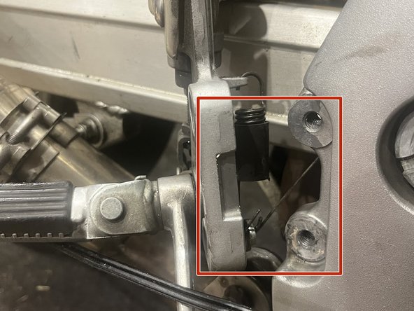 1999-2002 Suzuki SV650 Valve Inspection and Adjustment Replacement, Unscrew and Tuck Away Rear brake Paddle: crwdns2935265:019crwdnd2935265:02crwdnd2935265:03crwdne2935265:0