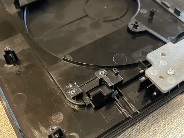 Sony DVP-FX820 Full Teardown, Freeing the Hinge: crwdns2935265:013crwdnd2935265:02crwdnd2935265:03crwdne2935265:0