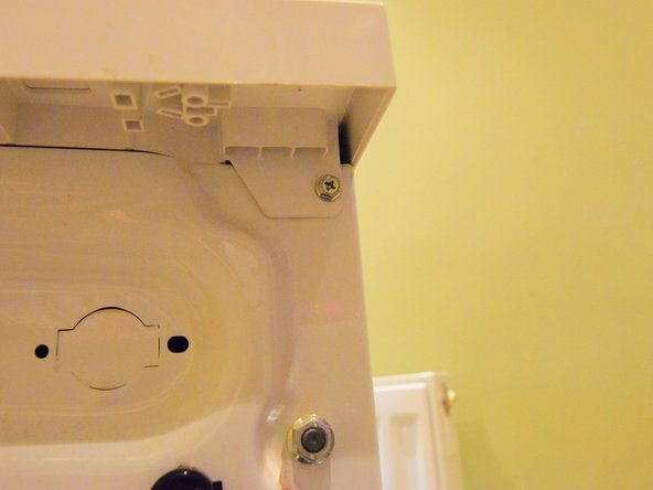 AEG Lavamat L14850 washer dryer Inlet valve Replacement, Remove top lid: crwdns2935265:03crwdnd2935265:02crwdnd2935265:02crwdne2935265:0