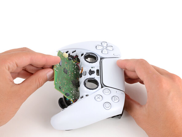 DualSense Controller V5 Microphone Replacement, Flip the controller over: crwdns2935265:026crwdnd2935265:02crwdnd2935265:02crwdne2935265:0