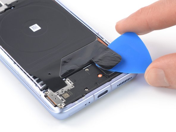 Xiaomi 12 Screen Replacement, Loosen the charging coil assembly: crwdns2935265:09crwdnd2935265:02crwdnd2935265:03crwdne2935265:0