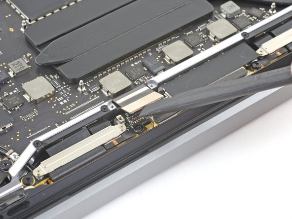 MacBook Pro 13" 2022 (M2) Display Assembly Replacement, Disconnect the display: crwdns2935265:017crwdnd2935265:02crwdnd2935265:02crwdne2935265:0