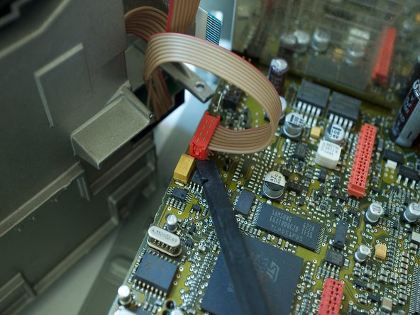 Porsche 997.1 PCM 2.1 Screen Replacement, Disconnect the PC ribbon cables joining the facia to the chassis: step 10, image 2 of 2