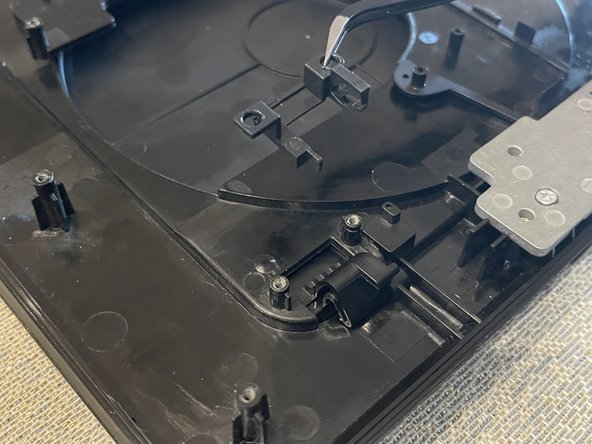 Sony DVP-FX820 Full Teardown, Freeing the Hinge: crwdns2935265:013crwdnd2935265:03crwdnd2935265:03crwdne2935265:0