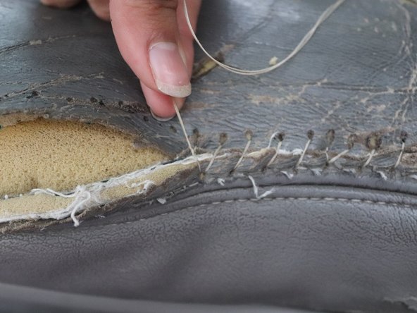 How to Repair a Leather Car Seat Rip With Needle and Thread: step 8, image 1 of 3