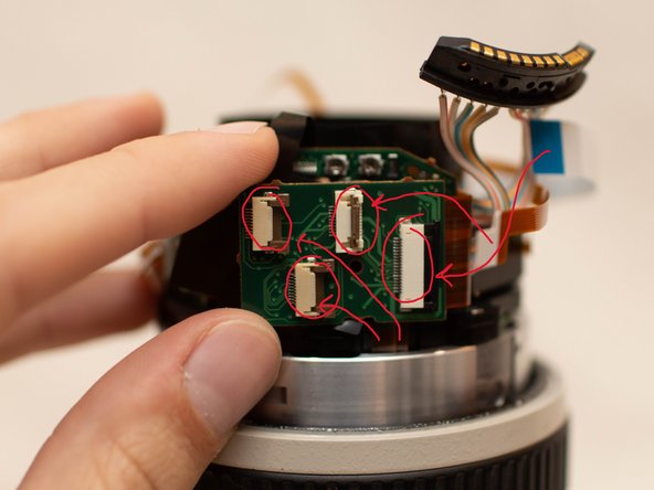 Canon EF 70-200mm f/2.8L IS USM Zooming Key Replacement, Connect Ribbon Cables and Install Tape: crwdns2935265:019crwdnd2935265:03crwdnd2935265:03crwdne2935265:0