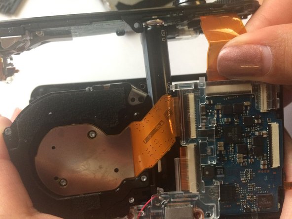 Cyber-shot DSC-H55 Lens Replacement, Removing Top Shell: crwdns2935265:09crwdnd2935265:02crwdnd2935265:03crwdne2935265:0