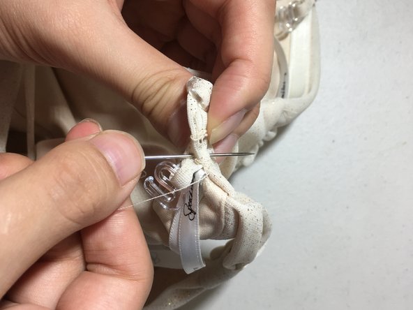 How to sew a detached strap to a dress: step 15, image 1 of 2