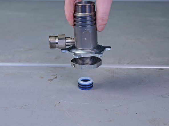 There are a total of six O-rings stacked on top of each other. Take note of their orientation and order.