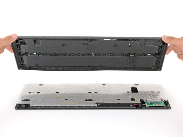 How to Open Your Logitech K295 Keyboard, Remove the bottom half: crwdns2935265:010crwdnd2935265:02crwdnd2935265:02crwdne2935265:0