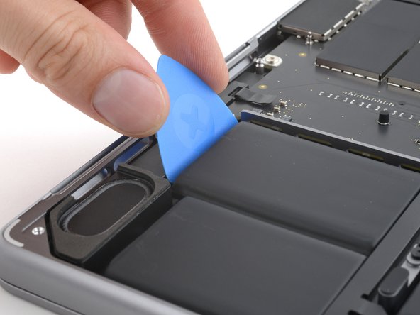 MacBook Pro 14" Late 2023 (M3) Battery Replacement, Pry up the stuck cells: crwdns2935265:034crwdnd2935265:02crwdnd2935265:03crwdne2935265:0