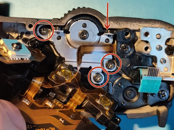 Sony A7 II Top Flex Cable replacement, Remove plastic bracket and control wheel: crwdns2935265:029crwdnd2935265:01crwdnd2935265:03crwdne2935265:0